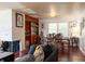 Formal dining room with brick fireplace, wood floors, and ample natural light at 320 Morrison Street, Mount Pleasant, SC 29464