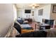 Bright living room with brick fireplace and comfortable seating at 320 Morrison Street, Mount Pleasant, SC 29464