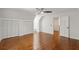 Bright bedroom features hardwood floors, double closets, neutral paint and a ceiling fan at 338 Mcclellan Ave, McClellanville, SC 29458