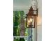 Close-up of the exterior lantern, highlighting its classic design at 338 Mcclellan Ave, McClellanville, SC 29458