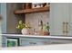 Close-up of kitchen details showing open shelving, modern appliances, and attractive cabinetry at 338 Mcclellan Ave, McClellanville, SC 29458