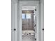 Stylish bathroom showcasing a glass shower, gray tiling, and elegant fixtures viewed from the doorway at 360 Parish Farms Dr, Summerville, SC 29486