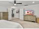 Large bedroom with connecting room, neutral colors, ceiling fan, and an abundance of natural light at 360 Parish Farms Dr, Summerville, SC 29486