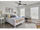 Bright bedroom with neutral decor, a ceiling fan, and two windows for plenty of light at 360 Parish Farms Dr, Summerville, SC 29486