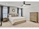 Spacious bedroom with neutral tones, ceiling fan, and ample natural light, creating a serene atmosphere at 360 Parish Farms Dr, Summerville, SC 29486