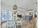 Open-concept kitchen and dining area with modern cabinetry, stainless appliances and hardwood floors throughout at 360 Parish Farms Dr, Summerville, SC 29486
