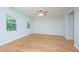 Neutral-toned bedroom with hardwood floors and bright natural light at 3745 Sawmill Ct, Mount Pleasant, SC 29429