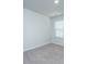 Empty bedroom with neutral carpet, white walls, window with blinds, and electric sockets at 3745 Sawmill Ct, Mount Pleasant, SC 29429