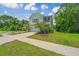 Attractive two-story home featuring a manicured lawn and inviting curb appeal at 3745 Sawmill Ct, Mount Pleasant, SC 29429