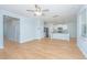 Open-concept living room and kitchen with hardwood floors and stainless appliances at 3745 Sawmill Ct, Mount Pleasant, SC 29429