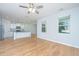 Bright living room with hardwood floors and an open view to the kitchen at 3745 Sawmill Ct, Mount Pleasant, SC 29429