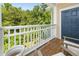 Balcony with a wooded view and partial seating at 400 Bucksley Ln # 301, Charleston, SC 29492
