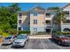 Building exterior view with parking spaces at 400 Bucksley Ln # 301, Charleston, SC 29492
