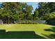 Well-maintained backyard with a lush green lawn, perfect for outdoor activities and enjoyment at 429 Venning St, Mount Pleasant, SC 29464