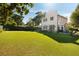 Expansive backyard with seating and dining areas, plus a lush green lawn, perfect for outdoor activities and enjoyment at 429 Venning St, Mount Pleasant, SC 29464