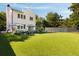 Expansive backyard with seating and dining areas, plus a lush green lawn, perfect for outdoor activities and enjoyment at 429 Venning St, Mount Pleasant, SC 29464