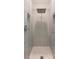 Bathroom featuring modern glass shower with grey subway tile and floor drain at 429 Venning St, Mount Pleasant, SC 29464