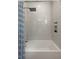 Bathroom showing the tub and shower featuring white subway tiles and a blue patterned shower curtain at 429 Venning St, Mount Pleasant, SC 29464