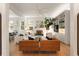 Bright, open living space with a fireplace, built-in shelving, and a seamless connection to the kitchen at 429 Venning St, Mount Pleasant, SC 29464