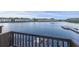 Balcony view overlooking calm waters and nearby waterfront homes at 4765 Arco Ln, North Charleston, SC 29418