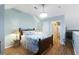 Inviting bedroom with wood floors, overhead lighting, and closet access at 4765 Arco Ln, North Charleston, SC 29418