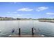 Dock equipped for fishing, ideal for enjoying the serene waterfront views at 4765 Arco Ln, North Charleston, SC 29418