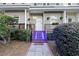 Inviting front porch with a well-maintained walkway, attractive planters, and step lighting at 4765 Arco Ln, North Charleston, SC 29418