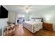 Cozy main bedroom with water views, light colors and balcony access at 4765 Arco Ln, North Charleston, SC 29418