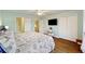 Cozy main bedroom with TV, ensuite bathroom and natural light at 4765 Arco Ln, North Charleston, SC 29418