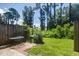 Backyard with a small brick patio is the perfect outdoor retreat for relaxation or entertaining guests at 507 Stinson Dr # E8, Charleston, SC 29407