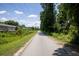 Tree-lined street view, perfect for walking or biking, in a quiet and scenic residential neighborhood at 507 Stinson Dr # E8, Charleston, SC 29407