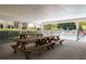 Covered picnic area with wooden tables and benches, perfect for outdoor gatherings at 507 Stinson Dr # E8, Charleston, SC 29407