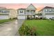 Charming two-story home featuring a welcoming front porch, landscaped yard, and attached two-car garage at 529 Dunswell Dr, Summerville, SC 29486