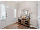 Charming entryway featuring a stylish console table, decorative mirror, and ample natural light at 529 Dunswell Dr, Summerville, SC 29486