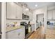 Kitchen featuring stainless steel appliances, granite countertops and white subway tile backsplash at 529 Dunswell Dr, Summerville, SC 29486