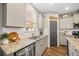 Well lit kitchen with granite countertops, stainless steel appliances and white subway tile backsplash at 529 Dunswell Dr, Summerville, SC 29486