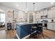 Modern kitchen with a center island, stainless steel appliances, and stylish pendant lighting at 529 Dunswell Dr, Summerville, SC 29486