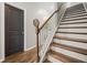 Staircase with wood treads and white risers at 529 Dunswell Dr, Summerville, SC 29486