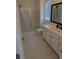Bathroom featuring tiled floor, white cabinets and drawers, and glass shower at 558 Pendleton Dr, Moncks Corner, SC 29461