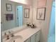 Bright bathroom featuring vanity, a mirror and floral decorations enhancing the space at 558 Pendleton Dr, Moncks Corner, SC 29461
