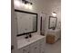 Bright bathroom with white cabinets, modern fixtures, and double sink vanity at 558 Pendleton Dr, Moncks Corner, SC 29461