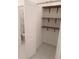 View of a closet with shelves and a glimpse into the adjacent bathroom at 558 Pendleton Dr, Moncks Corner, SC 29461