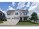 Charming two-story home with a two-car garage, beautiful landscaping, and a welcoming front porch at 558 Pendleton Dr, Moncks Corner, SC 29461
