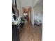 Inviting foyer with hardwood floors, a bench and clear sightlines into the spacious living areas at 558 Pendleton Dr, Moncks Corner, SC 29461