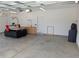 A spacious garage with high ceilings, concrete flooring, and ample workspace at 558 Pendleton Dr, Moncks Corner, SC 29461