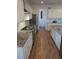 Bright kitchen with white cabinets, granite countertops, and stainless steel appliances for modern living at 558 Pendleton Dr, Moncks Corner, SC 29461