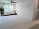 Bright living room features plush carpeting, stylish lighting, and large windows at 558 Pendleton Dr, Moncks Corner, SC 29461