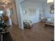 Open-concept living room features hardwood floors and ample natural light at 558 Pendleton Dr, Moncks Corner, SC 29461