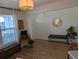 Spacious living area showcasing hardwood floors and a light fixture at 558 Pendleton Dr, Moncks Corner, SC 29461