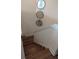 Wood staircase with white painted banister, leading to a landing with decor mirrors at 558 Pendleton Dr, Moncks Corner, SC 29461